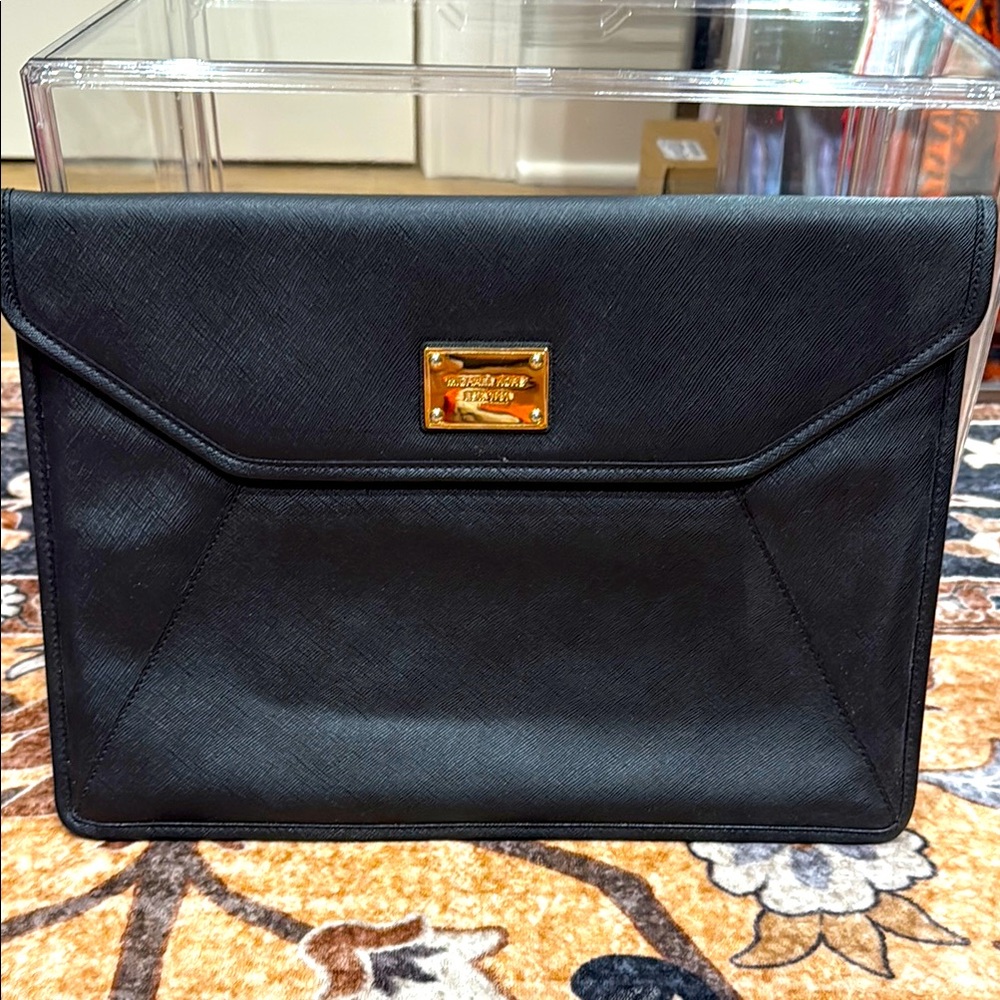 Michael Kors Black Laptop Bag with Structured Design and Gold Hardware